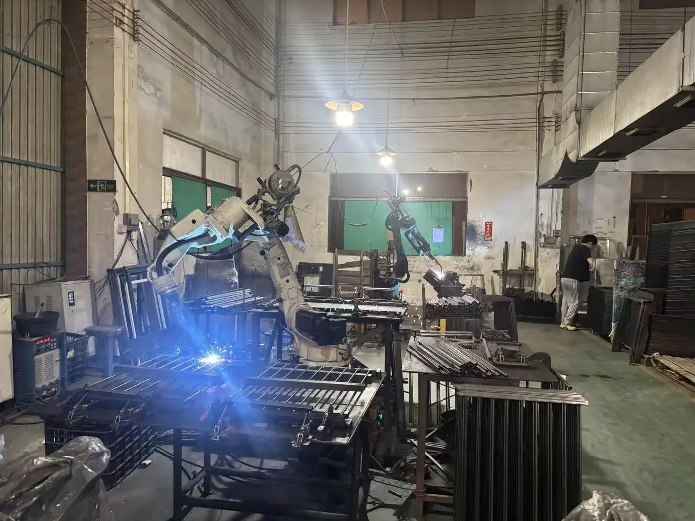 Robotic welding of metal baby gate frames at Jinlang